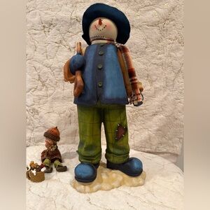 Colorful Snowman Figurine with Child